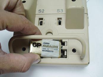 Insert one 9-Volt battery in the proper direction as indicated inside the