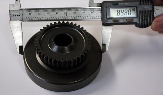 be measured with a sliding caliper just beside the radius from