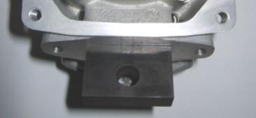exhaust valve gauge (ROTAX part 277030) until it stops at the surface of the cylinder (a feeler gauge of 0.