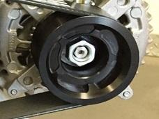 17. Install the supplied (3) billet smooth idler pulleys to the idler plate using the (3).