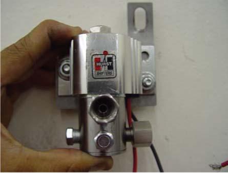 TOOLS: 7/16 Wrench, 7/16 Socket, Ratchet 3. Tighten the provided adapters and plugs to solenoid as shown.
