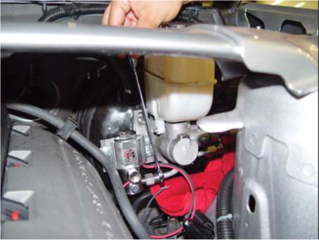 10. Recommended Installation Method: Thread the Hurst Roll Control brake line into the OEM front brake line, however, do not completely tighten fitting at this time to allow for minor adjustments.