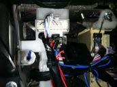 Reinstall all panels and connectors inside car,