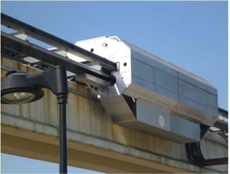 Figure 1 shows the sled vehicle on the ODU guideway. This vehicle was weighted to simulate the operation of one section of an operational vehicle.