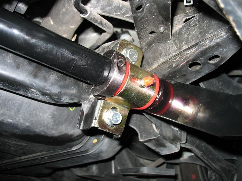 11. Install both locating collars on to the sway bar inboard of each bushing leaving about the thickness of a piece of paper between the collar and the bushing and tighten evenly using a 3/16 allen