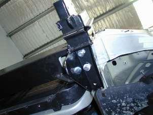 chassis rails. 14. Fit mounting system to front crossmember of vehicle and centralize sideways. 15.