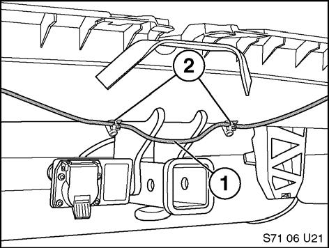 10 1. If vehicle is equipped with optional PDC install wire-ties with brackets (1) from installation kit onto mounting studs (2), located on trailer hitch cross member, as illustrated. 2.