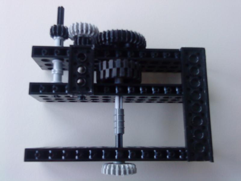 Technic, 1x10 x3/3 * with Holes 6 Technic, Plate 2x4 2 Wheel: ϕ ca. 3 cm 1 Technic, Axle: ca. 3.5 cm 1 *This notation means breadth x length x height of the specific LEGO-brick I fix the wheels as above.
