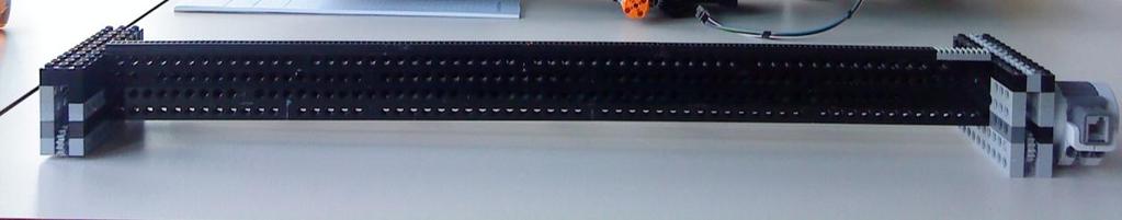 with Holes 7 times for a length of 70 LEGO-pimples Technic, Rack 1 x 4 16 Technic, Flat Tile 1x4x(1/3) 16 Technic, Axle For a length of ca 56 cm This bridge is the x-axis.