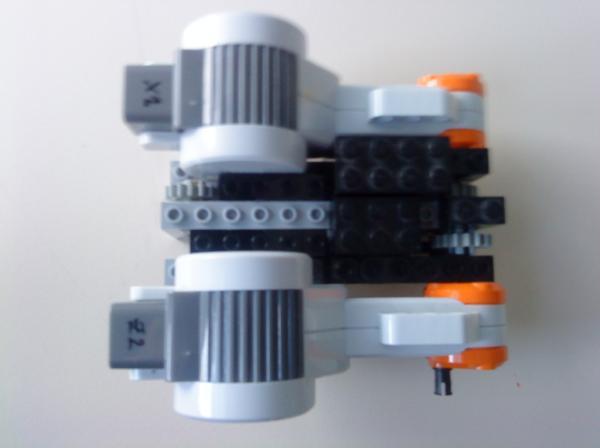 It uses gears to move on the x-axis as well as to move the z-axis with the object.