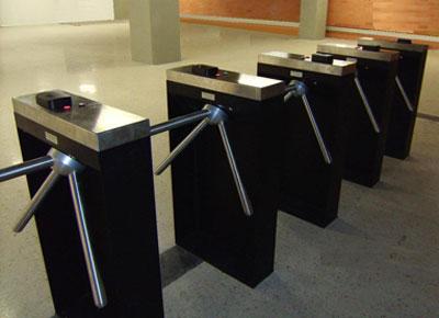 A turnstile provides security, controls crowds, prevents loss from theft, and controls admission and/or access.