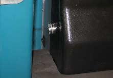 Remove both flush hoses from the storage bag located behind the operator seat. 2. Lock the operator seat cover open. 3.