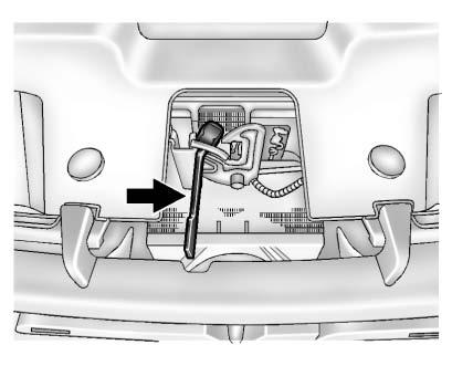 Vehicle Care 10-5 3. Push the secondary hood release to the right. 4. Lift the hood.