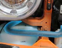 Connect the hose to the outlet of the water pump and secure with a hose clamp from