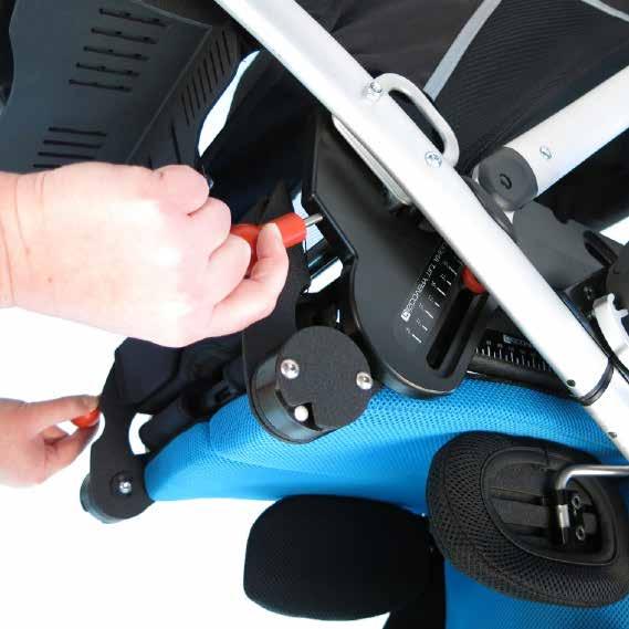 Press the front of the seat down onto the rear mounting bar of the stroller. The two red safety plungers (C) should self-lock onto the rear mounting bar.