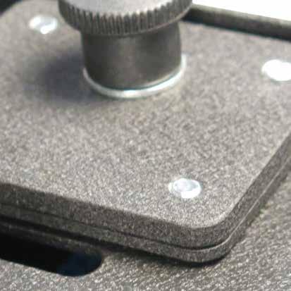 Place a single screw (D) through the hole in the seat base, slide on the slotted plate, washer and finally tighten the screw (D) by a few turns