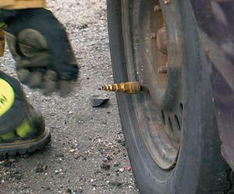 Next, the firefighters should secure the vehicle with cribbing or other applicable tools.