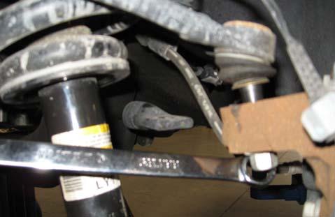 Unbolt and remove the sway bar end links from the vehicle. 3. Unbolt and remove the skid plate from the vehicle. Save for reinstallation. 4. Place the vehicle in neutral.