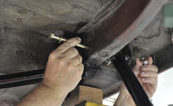 50. Install the lower suspension links at the factory front leaf spring mount using 1/2 diameter bolts, fl at