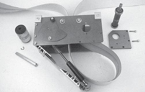 Place loop of belt (Figure 33, item BL) into the drive module between top idler pulleys (BM).