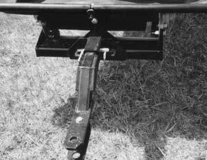 4.6 ATTACHING/UNHOOKING It is recommended that the Conveyor be attached to a tractor whenever it is moved. Follow this procedure when attaching to or unhooking from a tow unit: 1.