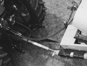 Start tractor and run at low idle. Fig. 17 PTO c. Place hydraulic control lever in detent. d. Increase engine speed to rated RPM. e. Start the flow of material and unload. C. Electric Motor Models: a.