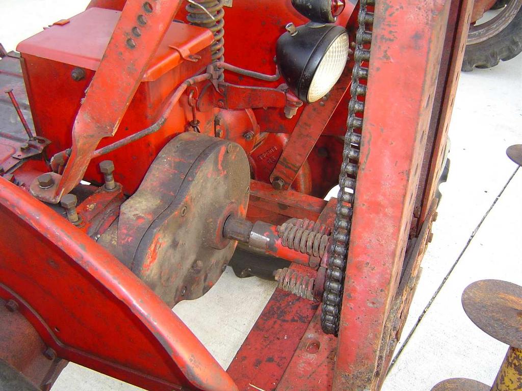 But aside from this, the success of the digger was apparent and performed as it was designed and intended. Gear reducer/reverser and chain drive on a Farmall Cub. 2011, S. Butram, West Lafayette, IN.