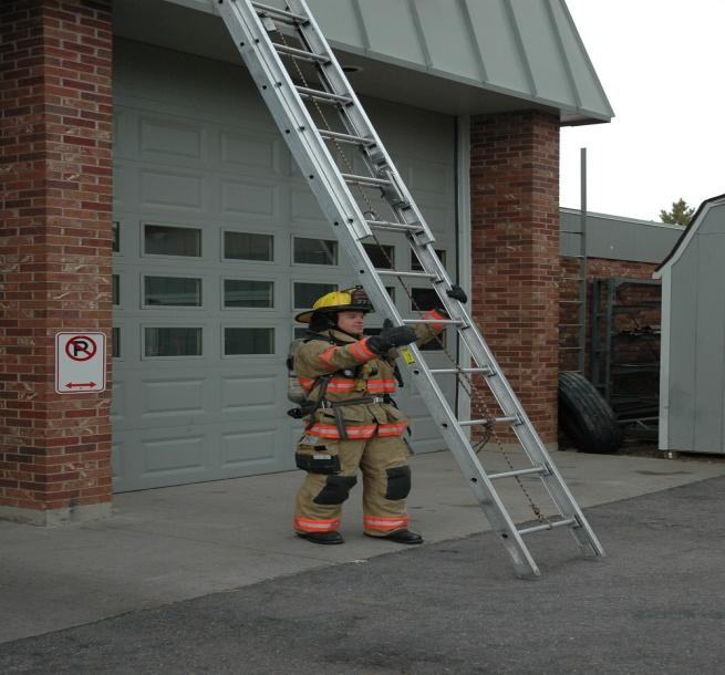 #10 Heel the ladder (if necessary). Note: Hands are off set and on the side of the beam when heeling the ladder.
