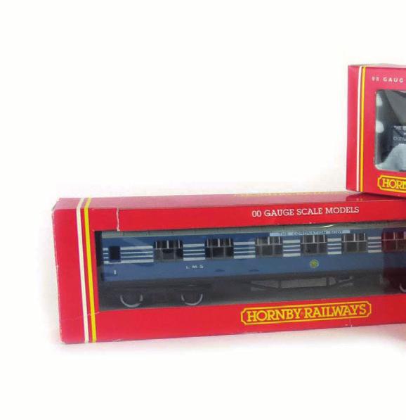 IHC OO gauge M9409 Pacifi c 'Canadian National' loco and tender, together with three IHC 'The National Limited' coaches, all boxed (4) 30-40 608 Two IHC OO gauge loco's