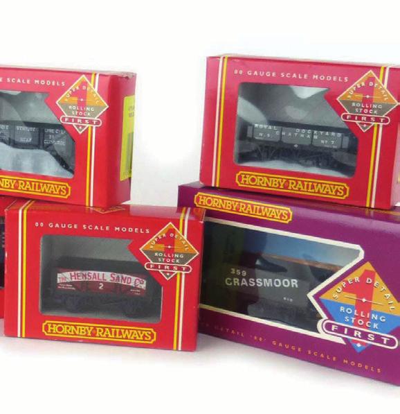 Western coach kits, all boxed (7) 30-40 Lot 611 (part) 610 Fourteen items of Bachmann and Bachmann Branch-Line OO gauge rolling stock (14) 30-40 611 Two Hornby Railways