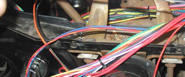 The factory Ford color (BLK/YLW) was not used in order to keep all gauge and back lighting wires the same color.