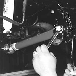 installation. (See Photo # 9) 17. Measure the length of the new control arms between the center of the rod end & eyelet on each control arm.