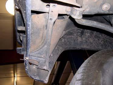 Remove eight bolts and two lower valence supports from two fenders and core support.