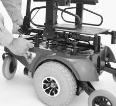 As the chair slows down, the front anti-tip wheels will automatically drop toward the ground. This will reduce the forward tip that is typically encountered with mid-wheel drive chairs. Figure 6.