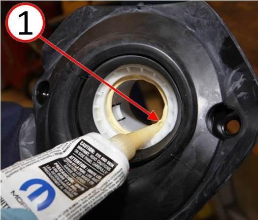 (Fig. 6). Fig. 6 Apply White Lithium To Inner Bearing Sleeve 1 - White Lithium Grease 7.