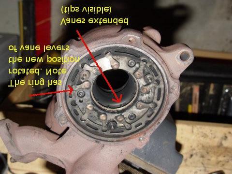 Compare this pic with the above photo to get an idea of how the actuator ring moves and changes the position of the vanes. The exhaust turbine fits into the center hole.