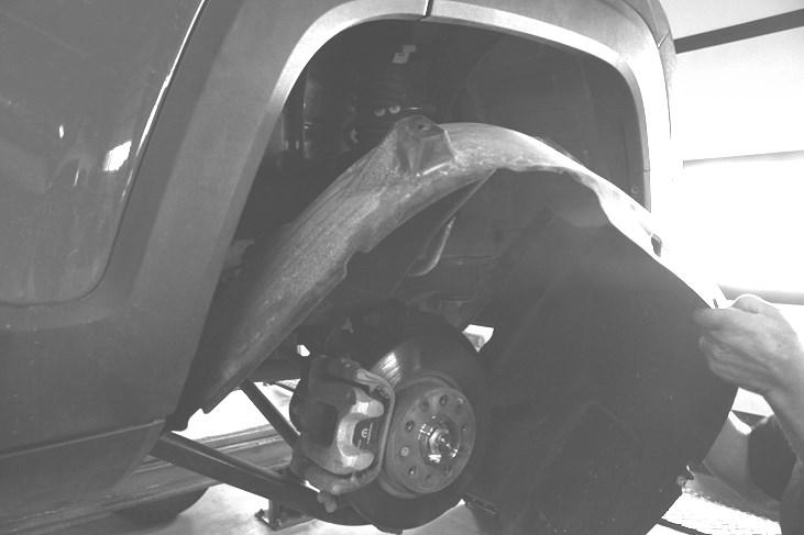 While working the tailpipe section, push the rear section of the exhaust forward 1/2 to 3/4.
