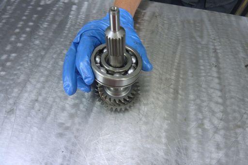 from the front (or input shaft) bearing using snap ring