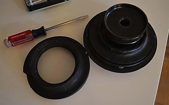 You will reuse the rubber spring isolator part of the factory strut mount. 20.