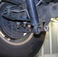 Rear Installation: 1. Remove the OEM rear shocks using a 21mm socket. (See Photo # 37) 2.