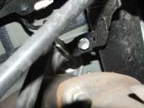 Using 12mm socket, remove sway bar end link nut and end link from frame mount. (See Figure J). 8.
