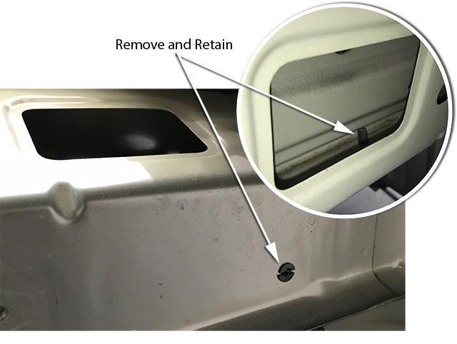 8 Remove and retain the inner guard liner mounting clip (shown) from the inner guard panel.