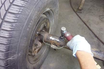Caution: Before welding the spring pads in place, carefully unclip and bend the brake lines out of the way