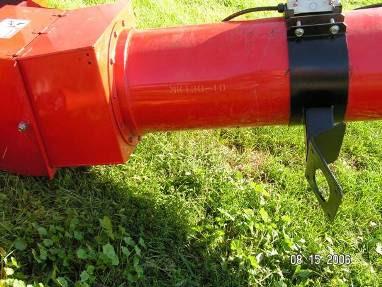 Place the motor mounting clamp around the auger tube approximately 15-20 from the intake of the hopper as shown in picture below.