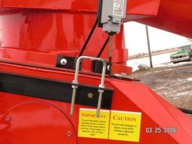 Whisker catching stop tab at least 1 1/4 or more IMPORTANT-- The point at which the swing hopper tube will come into contact with the main auger tube (home position) will vary depending upon the
