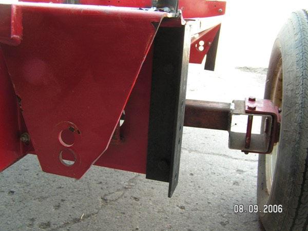Similar picture showing the outside 7 angle iron mounted to hopper with 2 3/8 x 1 bolts and nuts.