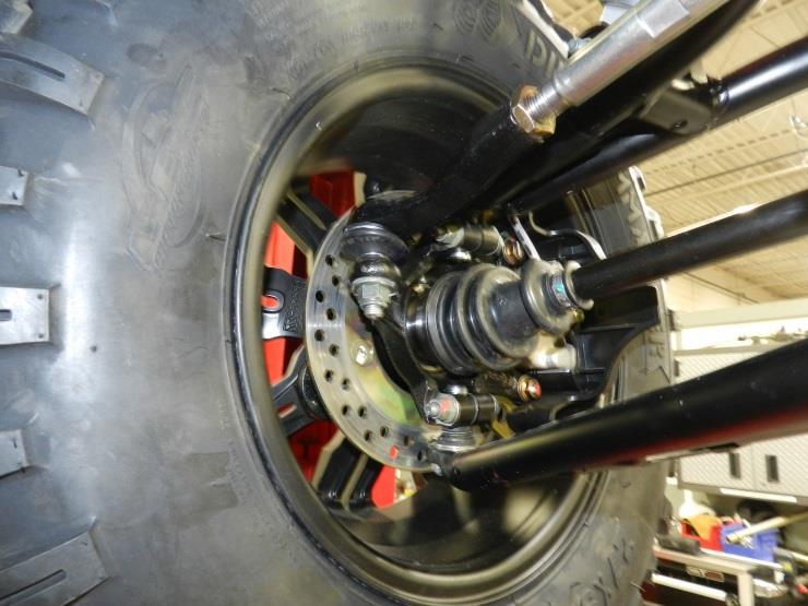 12. Place the new tie rod end on the steering arm making sure to mimic the old setup coming in from the top of the spindle. Install the rod end nut, and torque it to 35 ft lbs. 13.