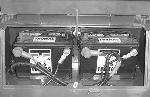 Remove any corrosion and coat the terminals with a dielectric grease. Check the battery hold downs to be sure they are properly retaining the battery in the compartment. (fig. C4667) BATTERY 5.