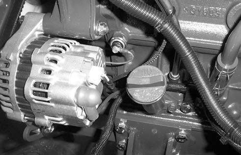 Removal (cont d) ENGINE REPLACEMENT 7.3 38 Disconnect the wires to the alternator. (fig. C4706) Note the connection and routing for reassembly. Remove the wire from the engine oil sensor.