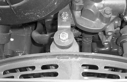 Remove any clamps that support the harness to the engine. C4706 Disconnect wires 40 Remove the bolts from the fan guard brace. Loosen the bolt for the shroud isolator.